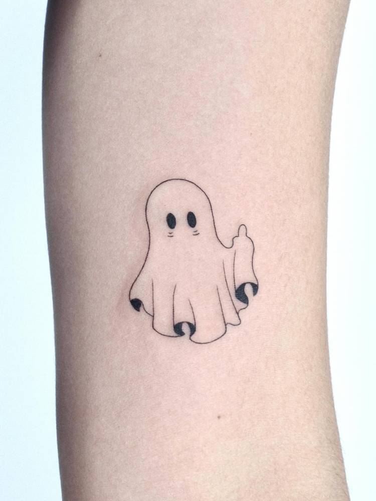 Rude ghost tattooed on the inner arm, illustrative style.