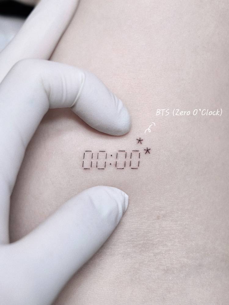 BTS Zero O'Clock tattoo located on the bicep.
