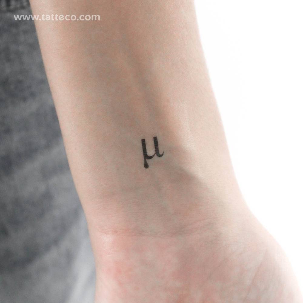 Mu μ temporary tattoo located on the wrist.
