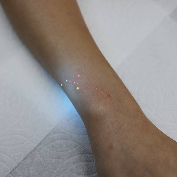 Minimalistic style Aries constellation tattoo located on the wrist.