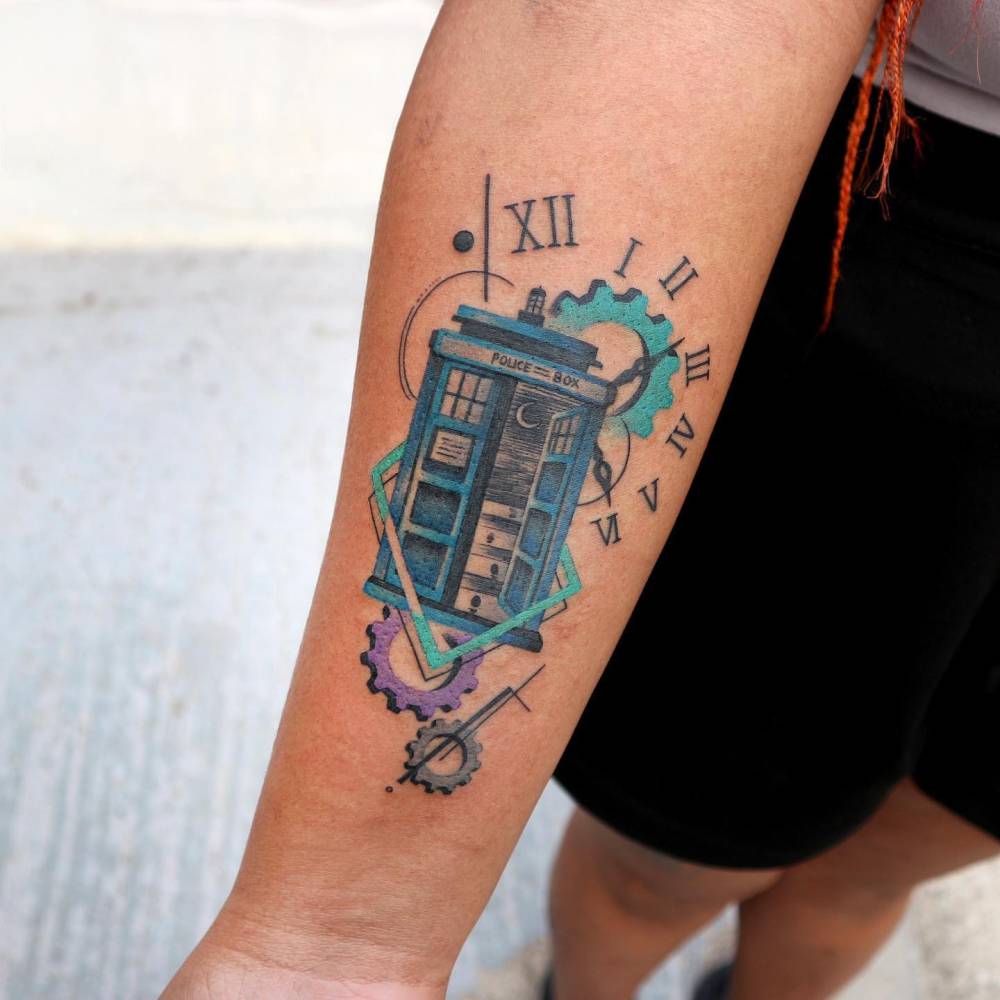 Doctor who tattoo located on the inner forearm, pop art style.