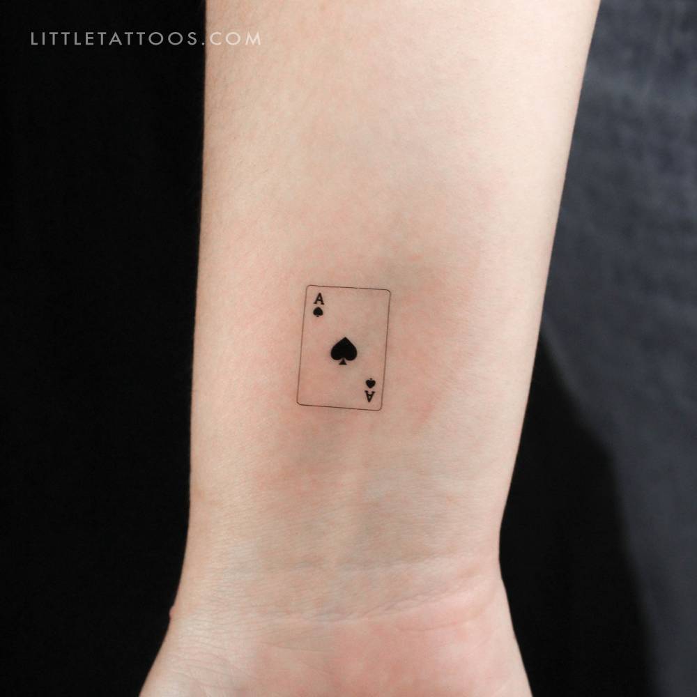 Ace of spades card temporary tattoo located on the wrist.