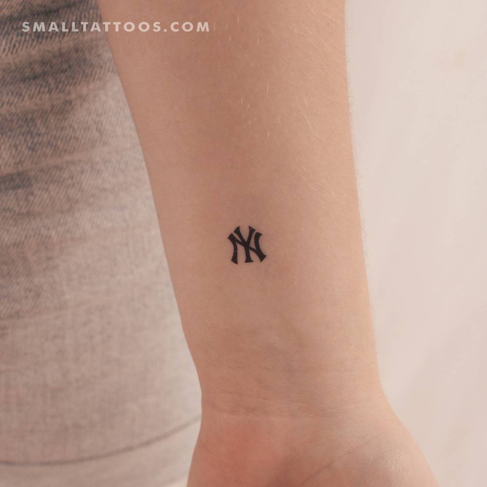 NY Yankees logo temporary tattoo located on the wrist.