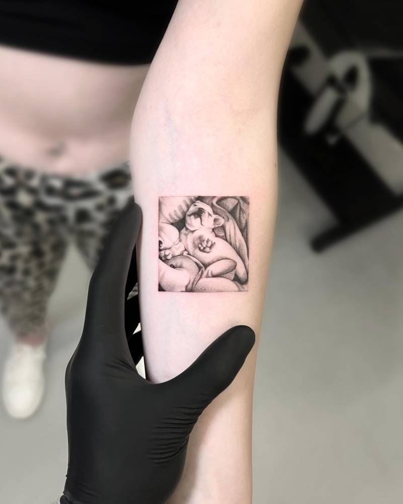 French bulldog tattoo located on the inner forearm.