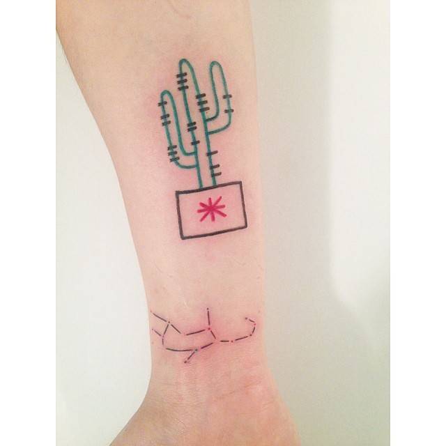 Saguaro and Virgo constellation tattoos located on the wrist and inner forearm.