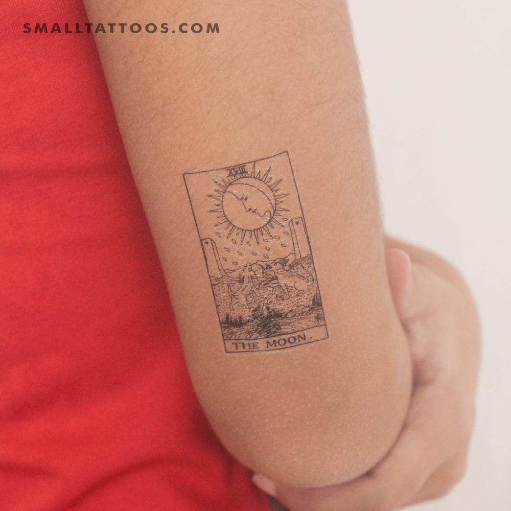 The Moon tarot card temporary tattoo located on the tricep.