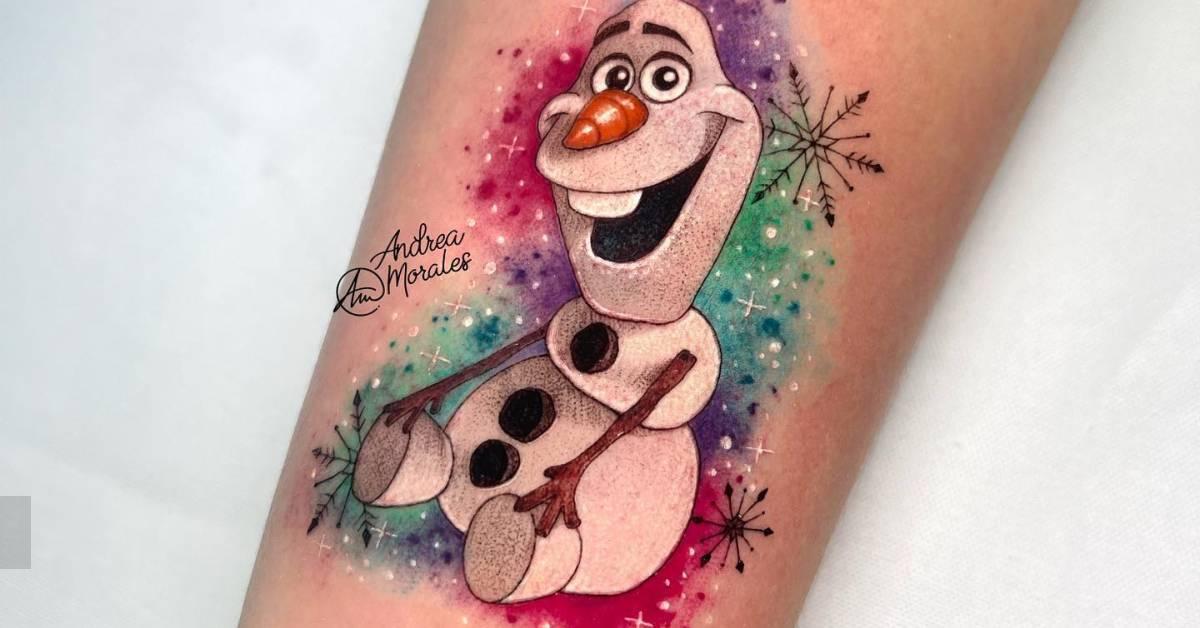 Cartoon style Olaf tattoo located on the inner forearm.