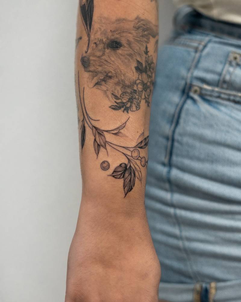 Coffea tattoo in illustrative style located on the wrist.
