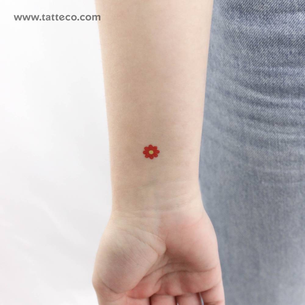 Red flower temporary tattoo in minimalistic style.