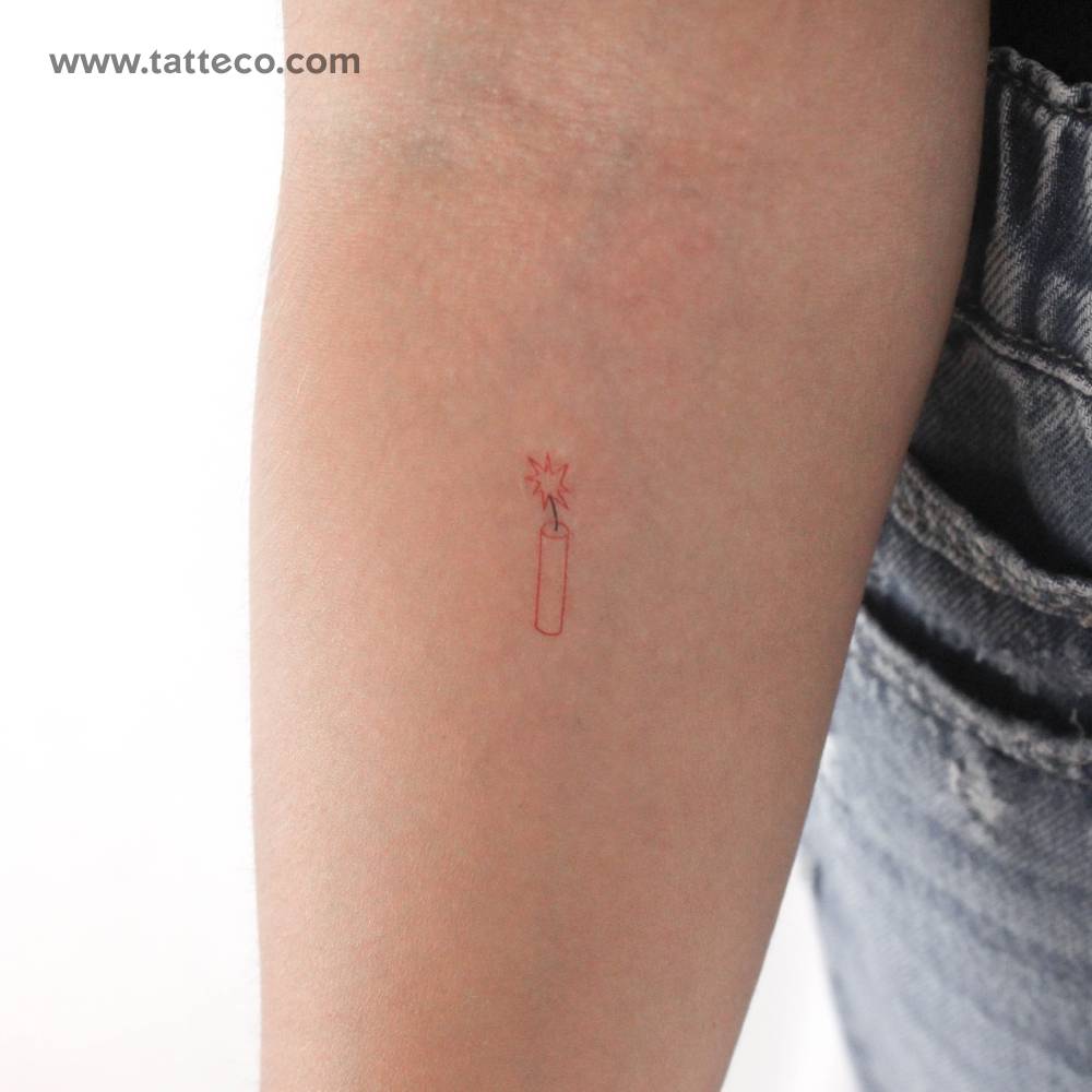 Fine line style minimalistic dynamite temporary tattoo placed on the inner forearm.