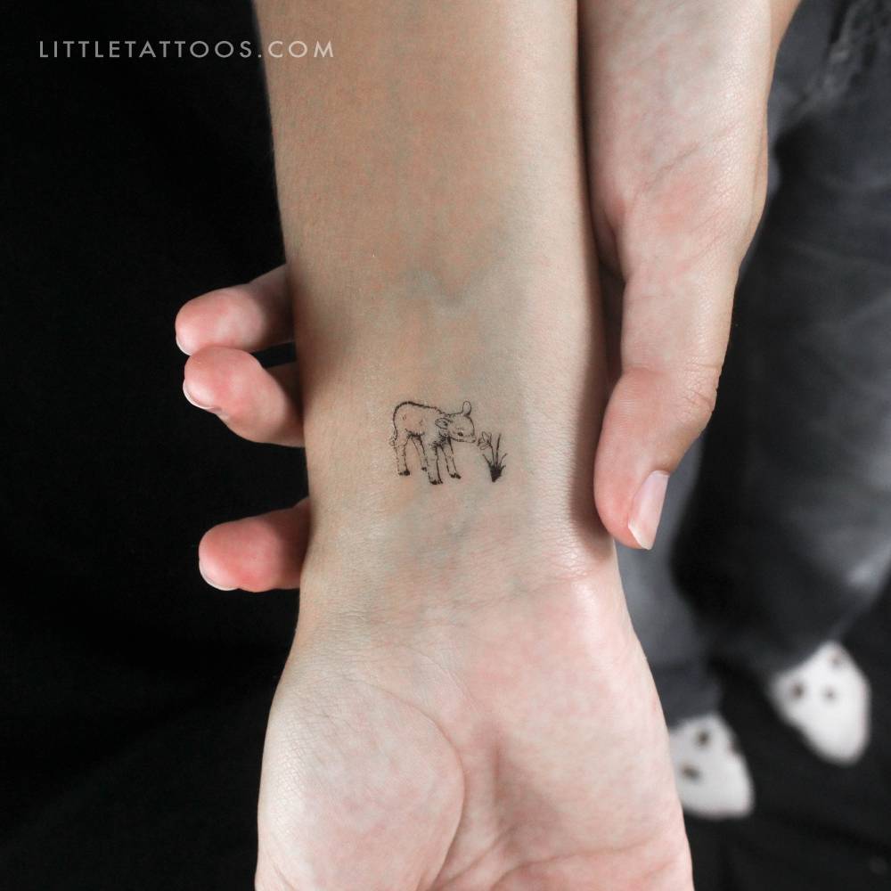 Little lamb temporary tattoo located on the wrist.
