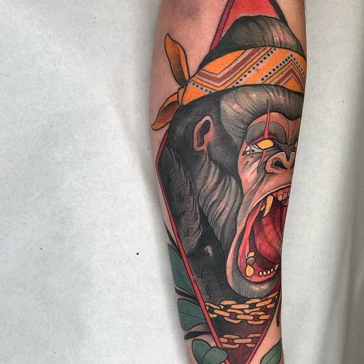 Neotraditional gorilla portrait tattoo on the forearm.
