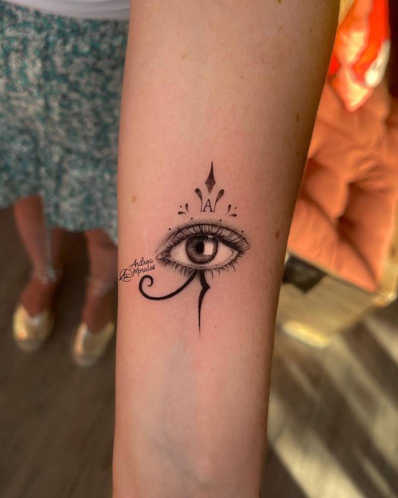Micro-realistic style Eye of Ra tattoo located on the inner forearm.