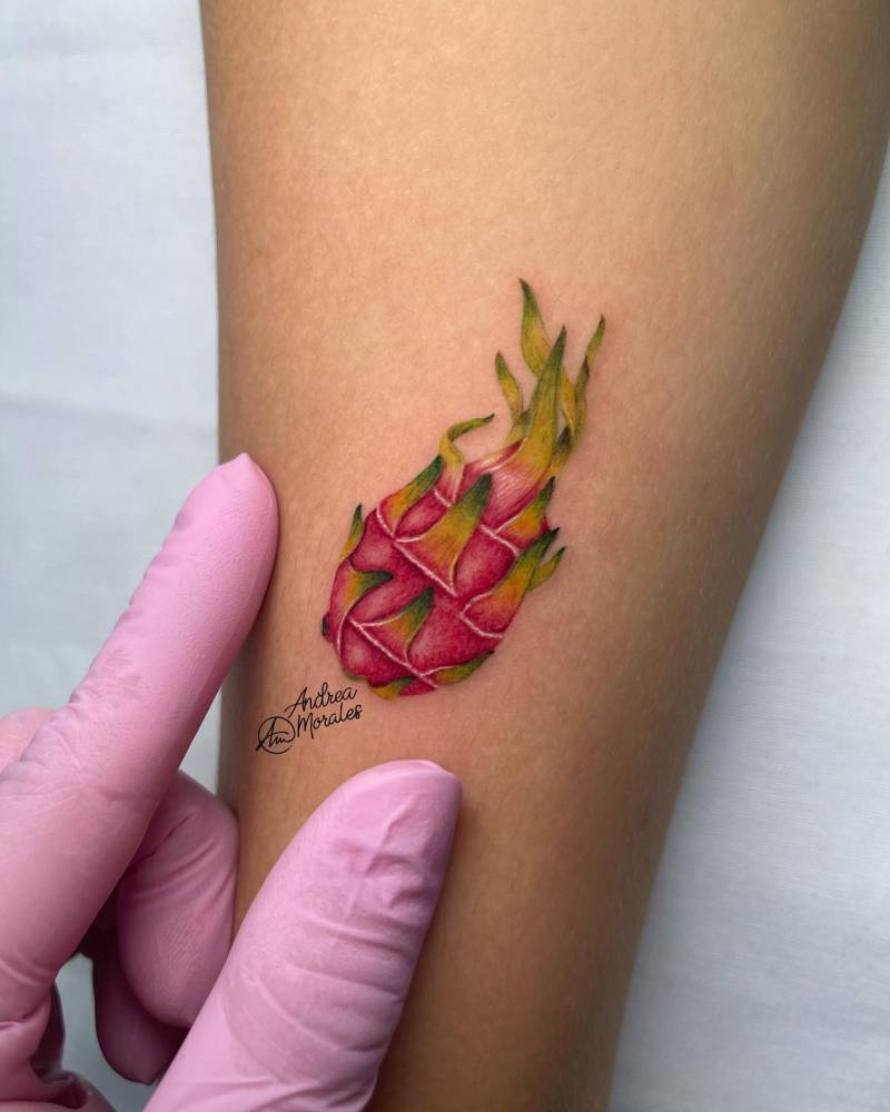 Dragon fruit tattoo located on the tricep, micro-realistic style.