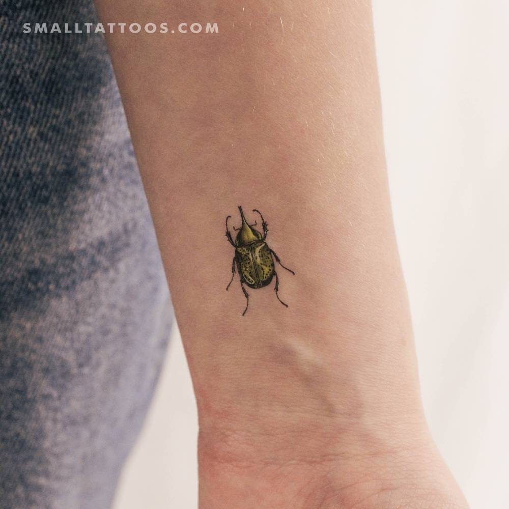 Hercules beetle temporary tattoo placed on the wrist.