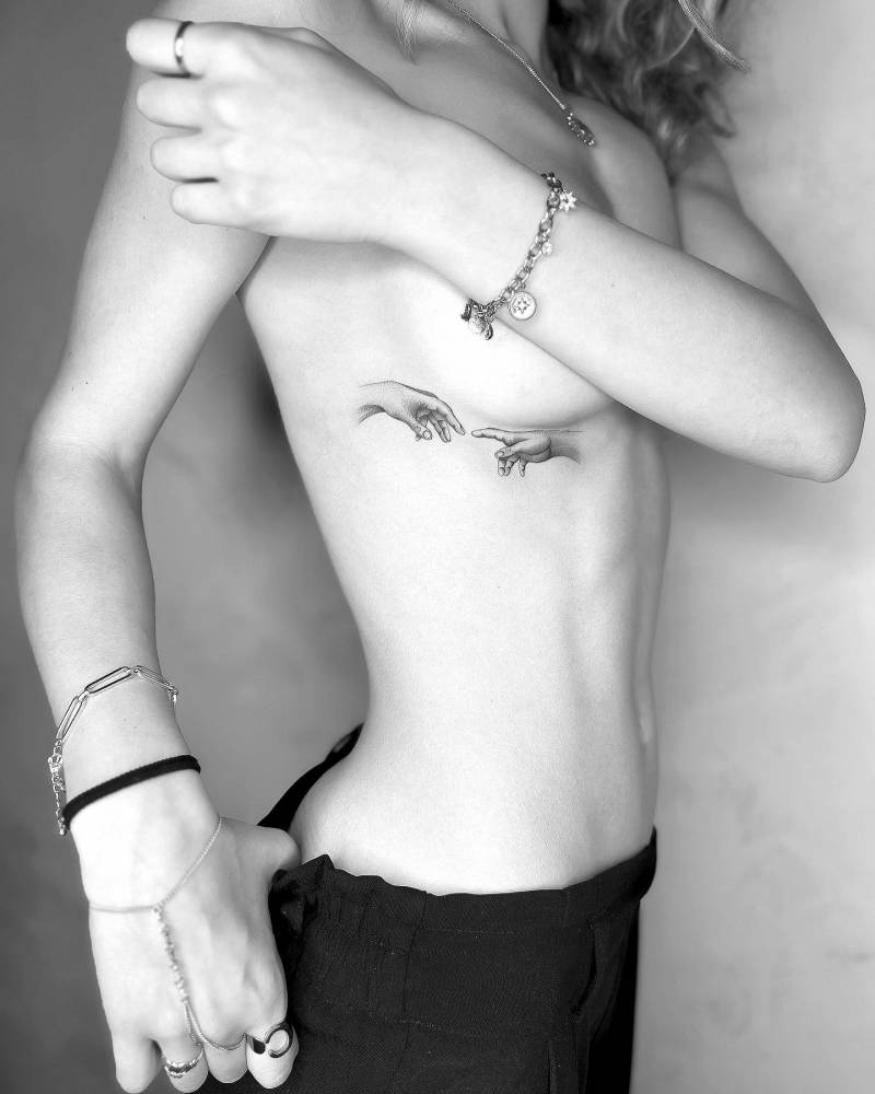 Creazione di Adamo - Michelangelo Buonarroti.