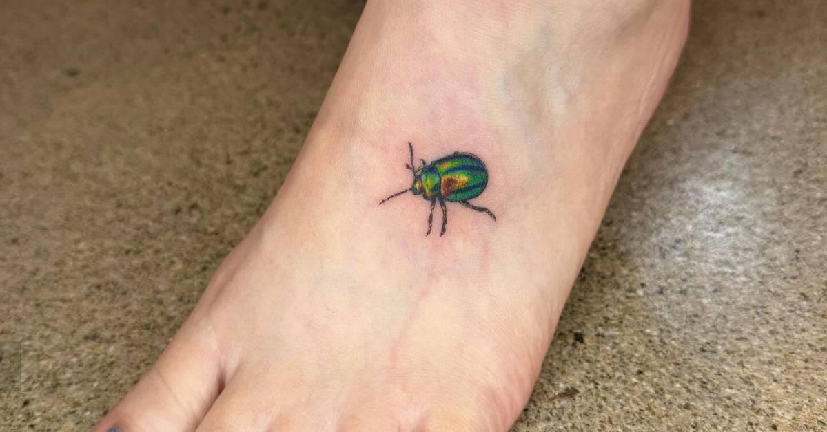 Foot Tattoos Insects Illustrative style beetle tattoo placed on the foot.