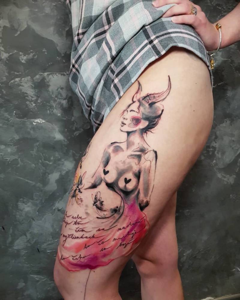 She-devil tattoo done on the thigh.