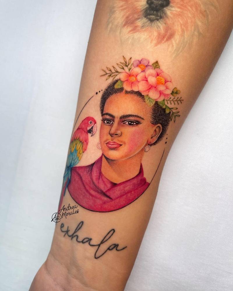 Frida Kahlo portrait tattoo placed on the wrist, micro-realistic style.