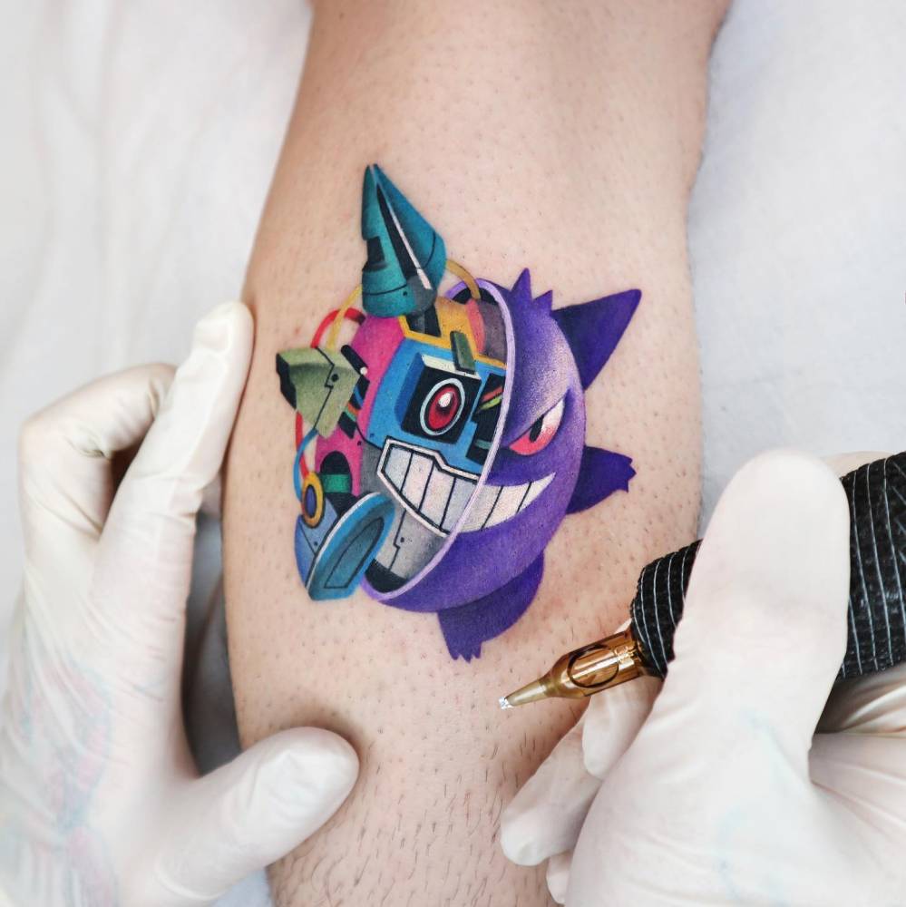 Robotic Gengar tattoo located on the calf, done in cartoon style.
