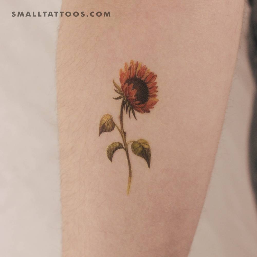 Sunflower temporary tattoo by Lena Fedchenko located on the inner forearm.