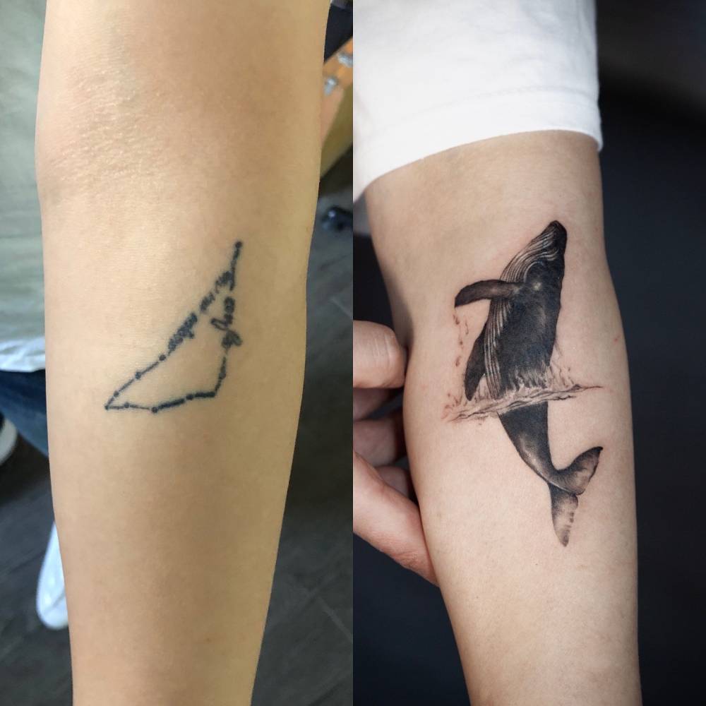 Micro-realistic style whale cover-up tattoo done on the inner forearm.