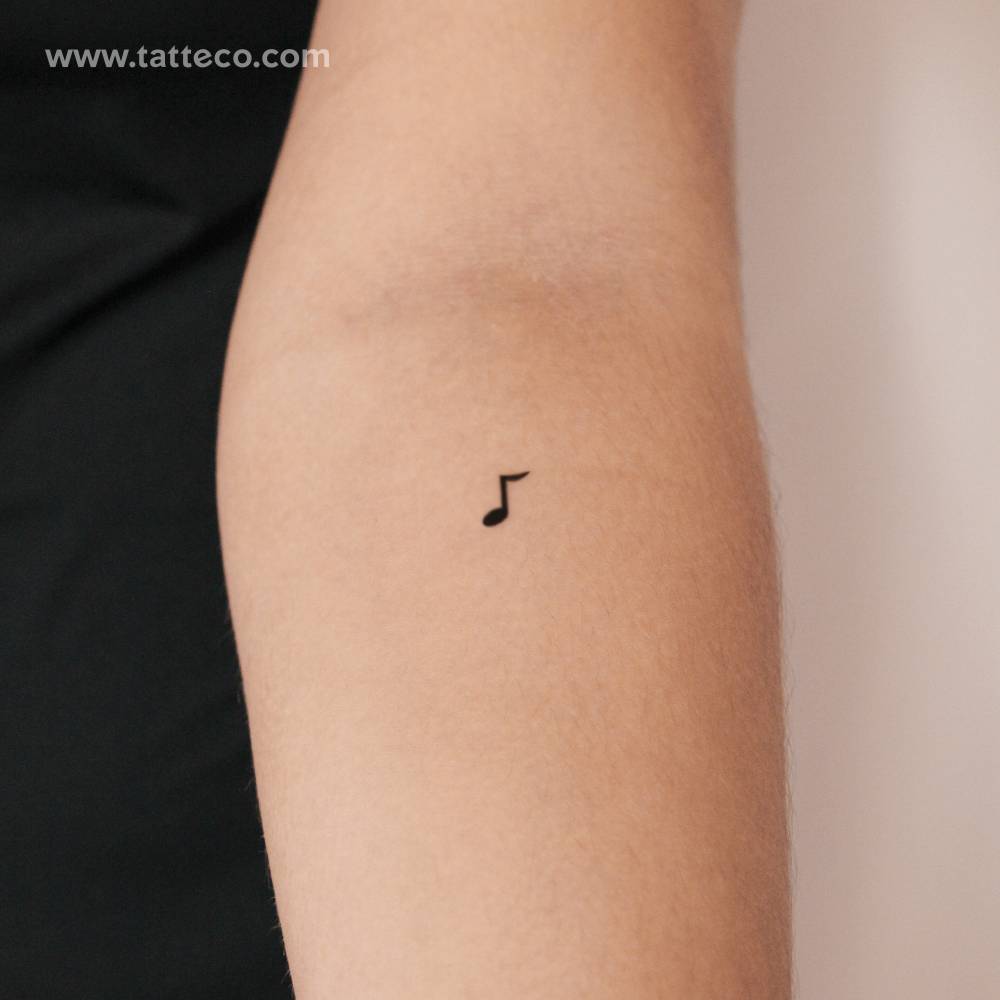 Small music quaver semi-permanent tattoo done on the inner forearm.