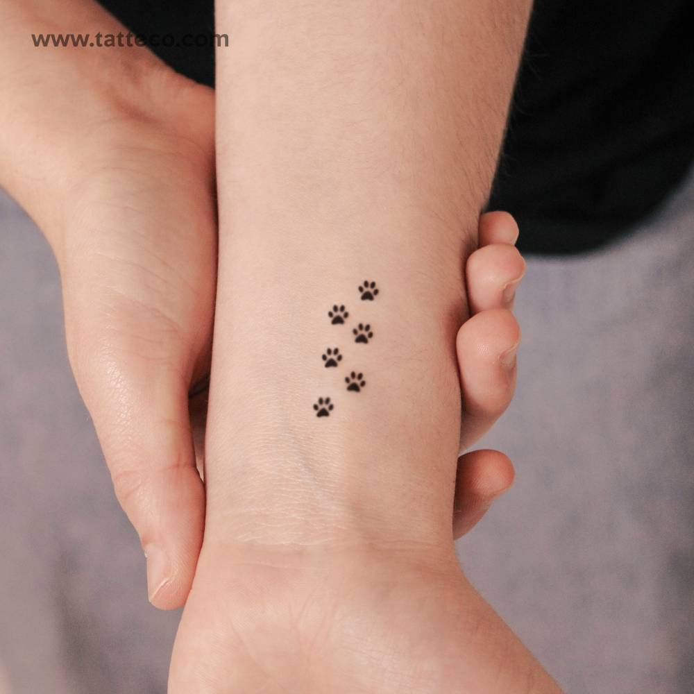 Six Tiny Paw Print Semi-Permanent Tattoo