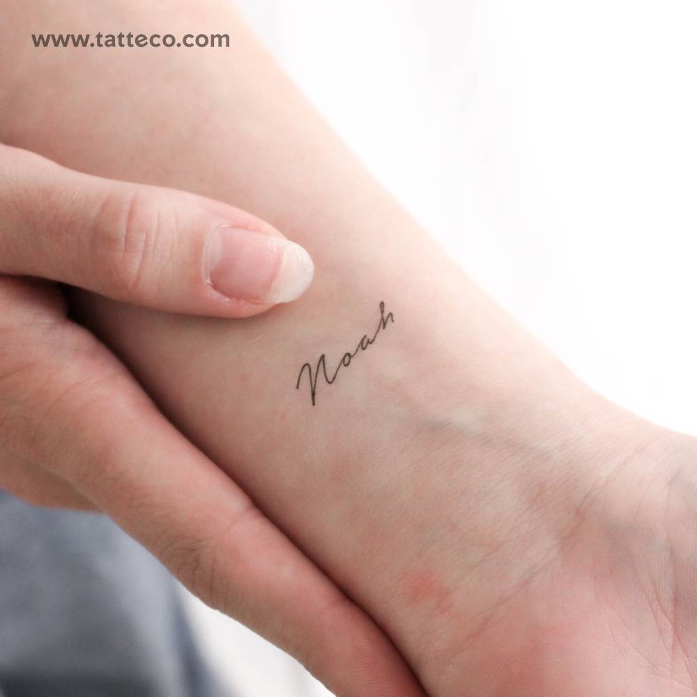 Handwritten font name "Noah" temporary tattoo located on the wrist.