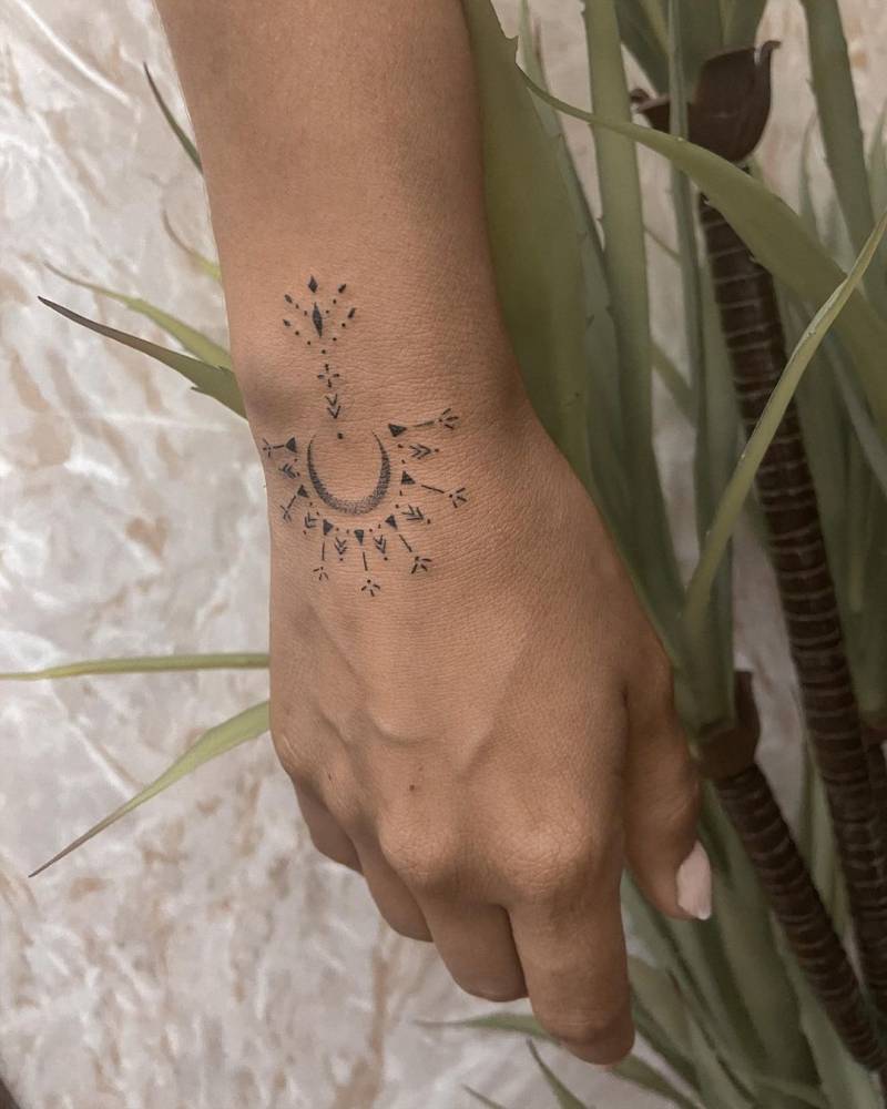 Ornamental tattoo on the wrist.