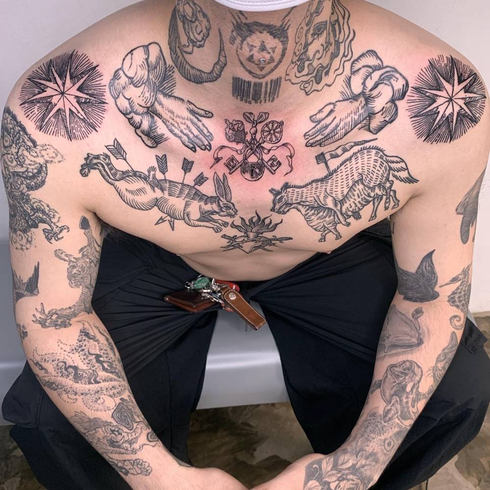 Individual matching stars tattooed on the shoulders.