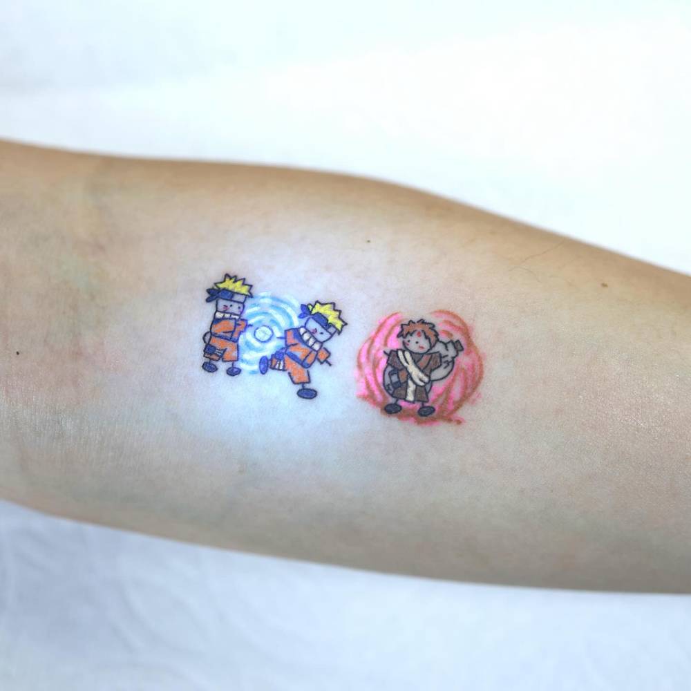 Cartoon style Naruto tattoo located on the inner forearm.