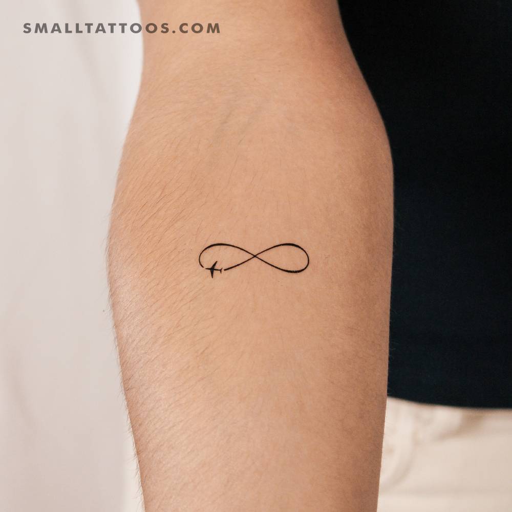 Traveller infinity symbol temporary tattoo located on the inner forearm.