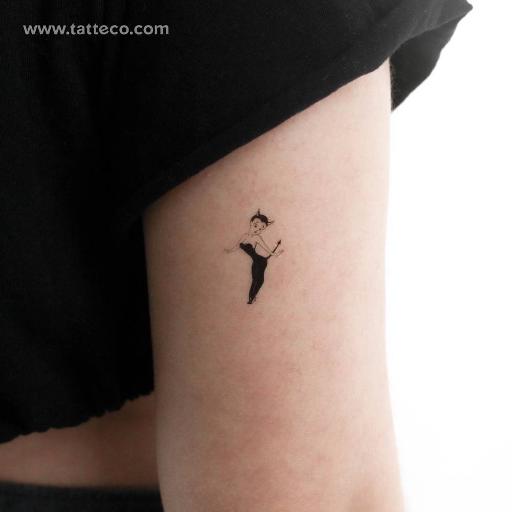 She-Devil temporary tattoo locayed on the tricep.