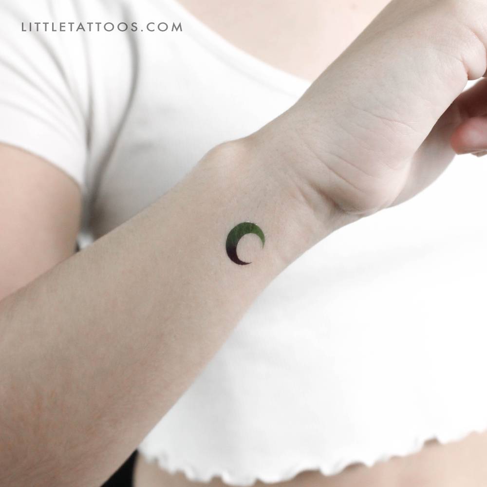 Blue and green crescent moon temporary tattoo.