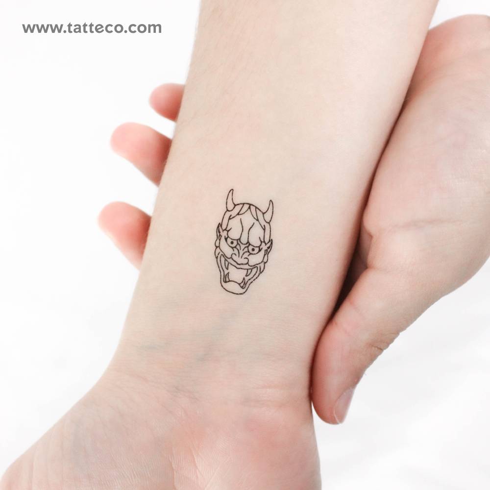 Fine line style Hannya temporary tattoo located on the wrist.