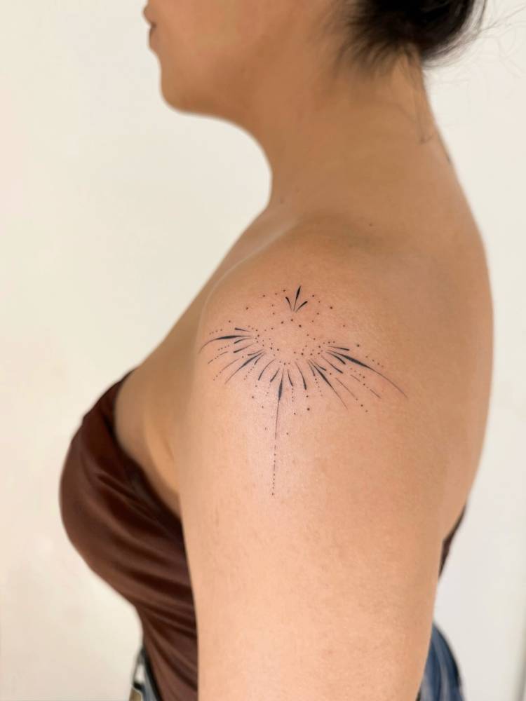 Ornamental shoulder tattoo.