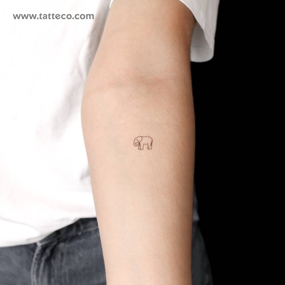 Tiny minimalistic elephant semi-permanent tattoo located on the inner forearm.