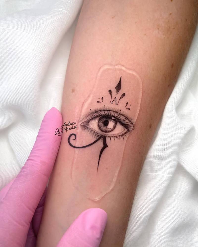 Micro-realistic style Eye of Ra tattoo located on the inner forearm.