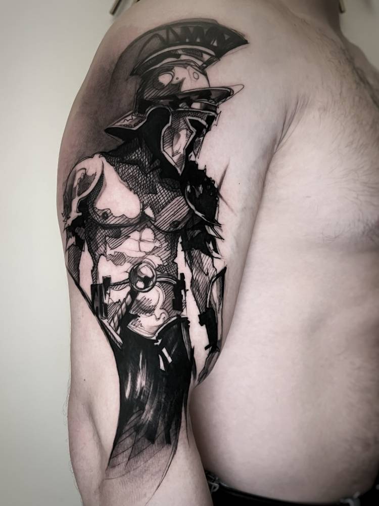Spartan warrior tattoo in sketch work style done on the upper arm.