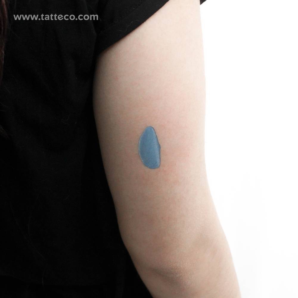 Watercolor style turquoise brush stroke temporary tattoo.