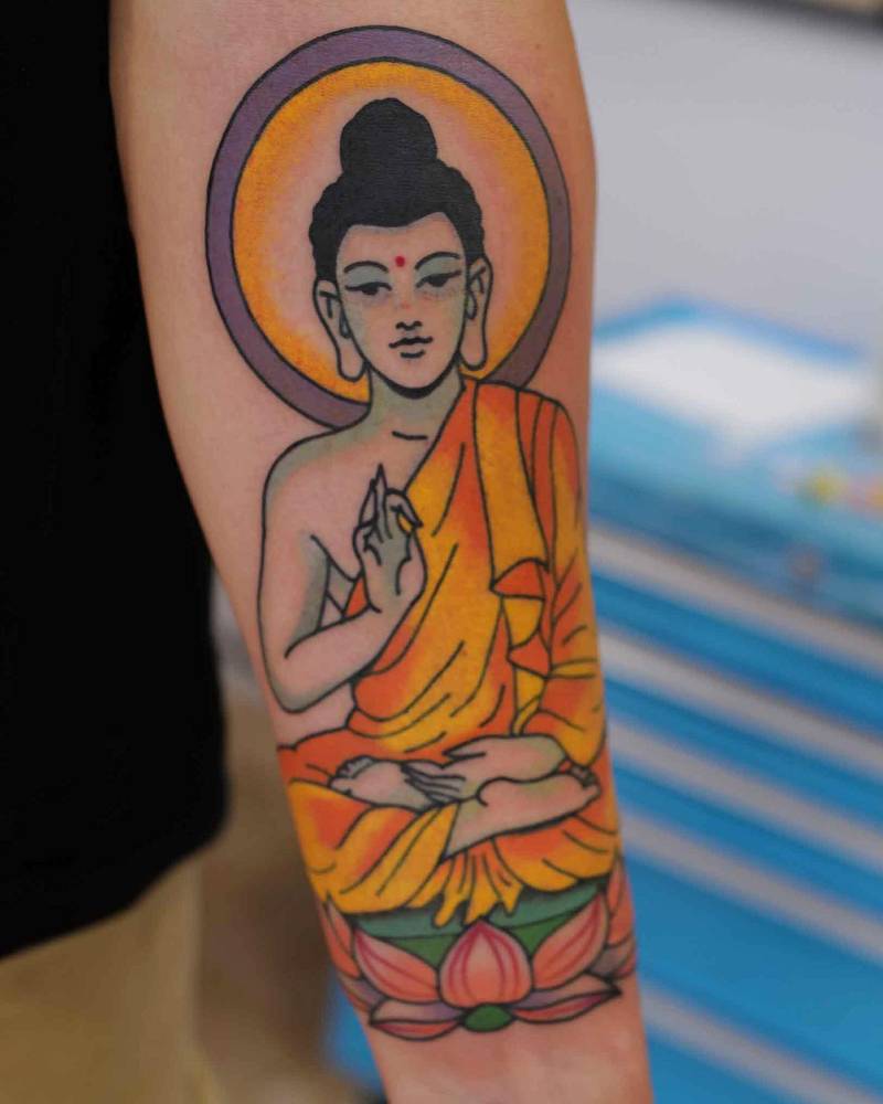 Buddha tattoo in traditional style placed on the inner forearm.
