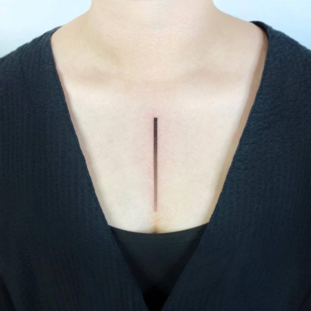 Spectrum line tattoo located on the chest.