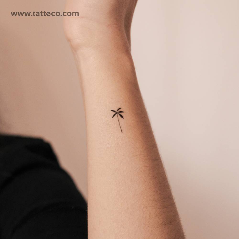 Coconut tree semi-permanent tattoo located on the wrist.
