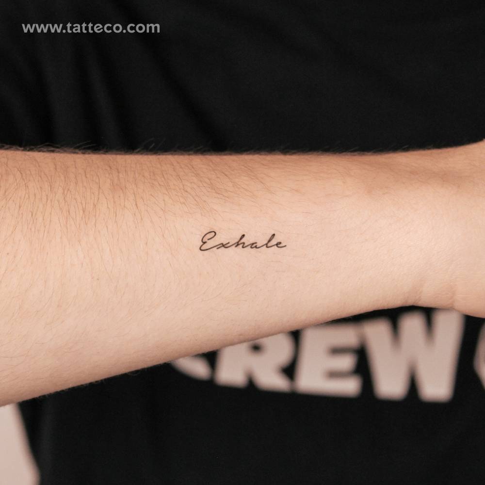 Handwritten font "exhale" semi-permanent tattoo located on the wrist.