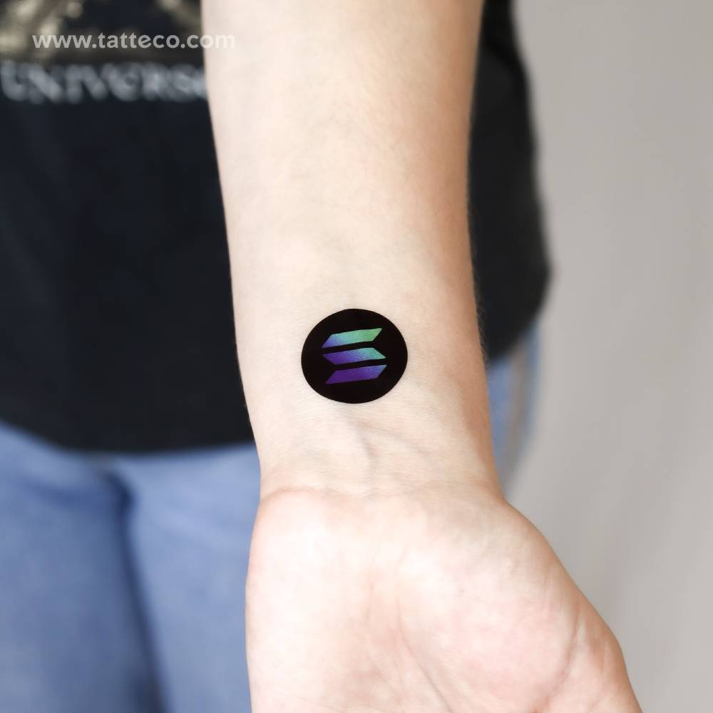 Solana logotype temporary tattoo located on the wrist.