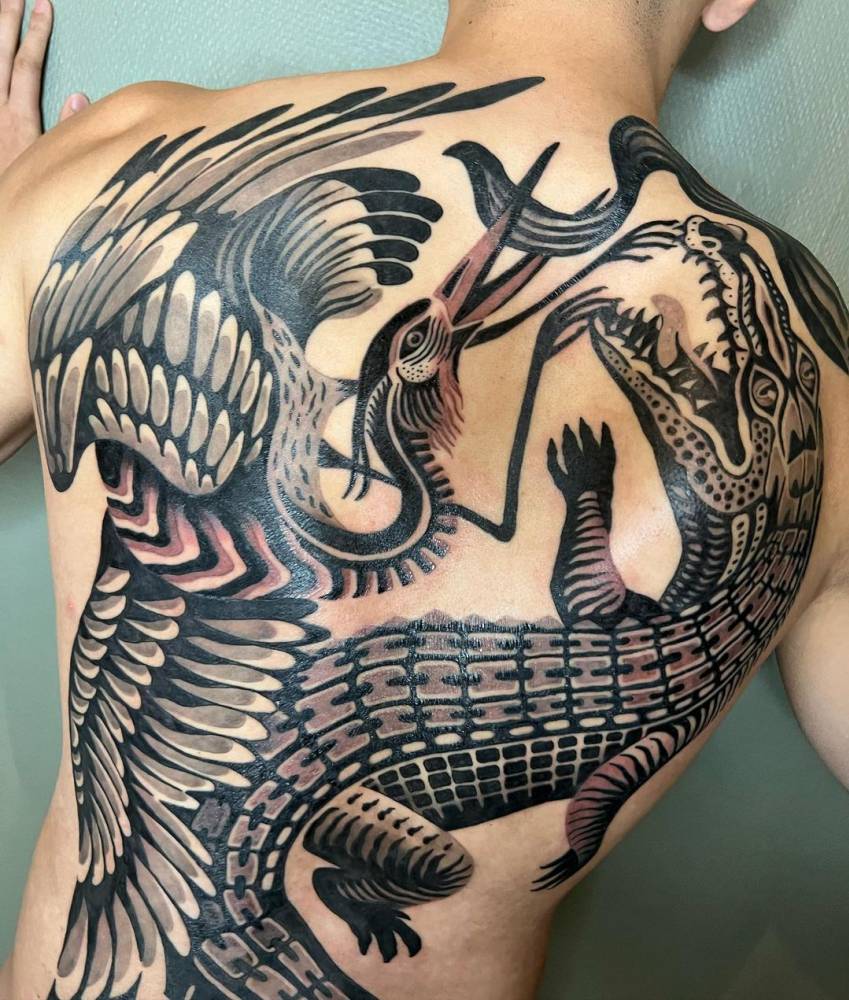 Crane and crocodile battle royale.