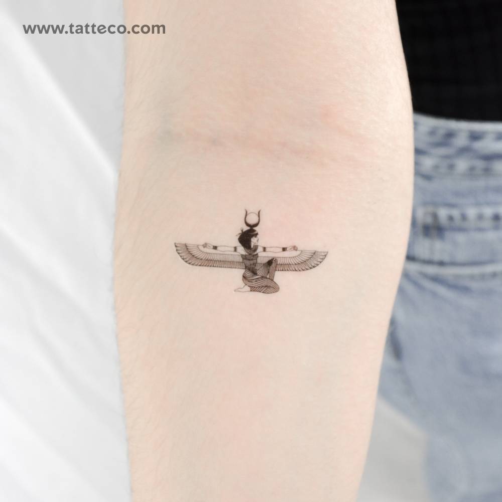 Small Isis temporary tattoo located on the inner forearm.