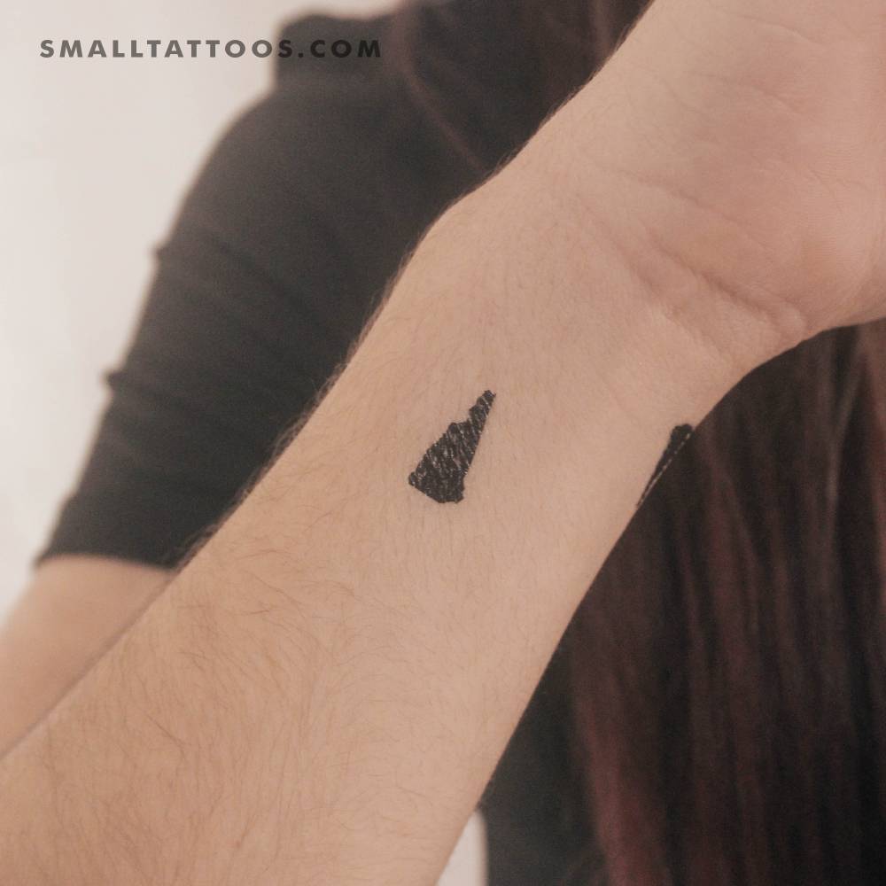 New Hampshire map temporary tattoo located on the wrist.