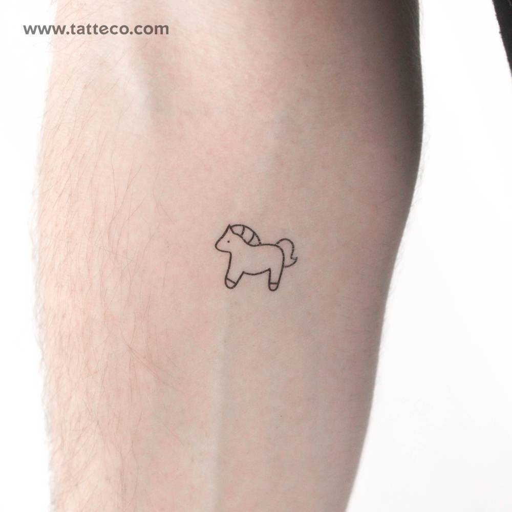 Tiny minimalist horse temporary tattoo located on the inner forearm.